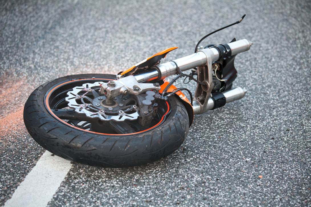 A motorcycle wheel on the ground

AI-generated content may be incorrect.